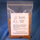 Photo of a bag of dewaxed blond shellac flakes