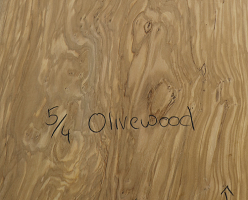 Close up photo of the grain patterning in the Olive Wood Slabs