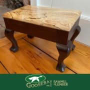 Photo of sapele and maple footstool made by Ted West. photo branded to Goosebay Sawmill and Lumber