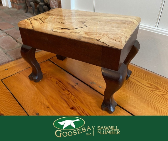 Photo of sapele and maple footstool made by Ted West. photo branded to Goosebay Sawmill and Lumber